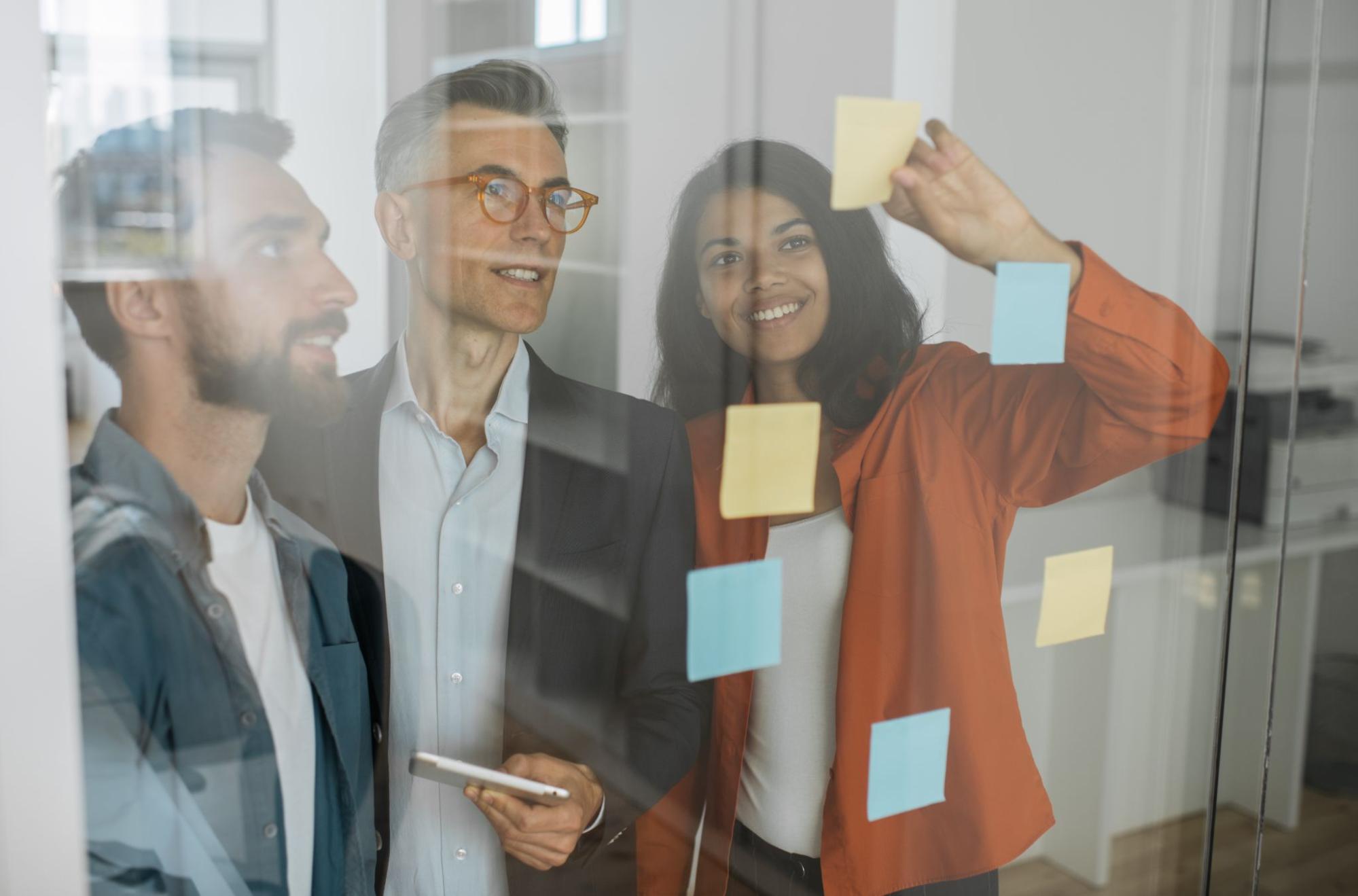 Team brainstorming with sticky notes